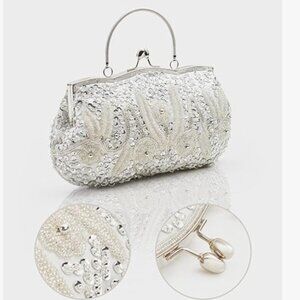 silver sequined clutch